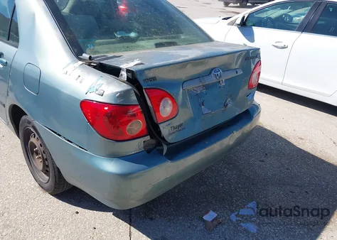 2005 Toyota Corolla Ce z USA, uszkodzony, nr VIN 2T1BR32E85C557020